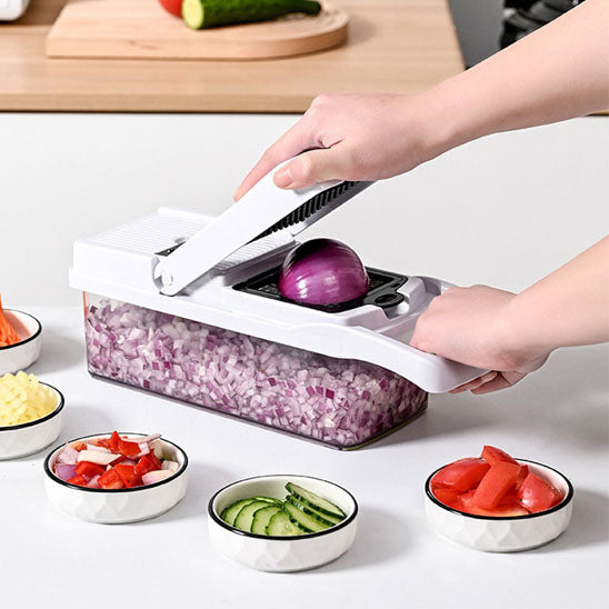 Coupe légumes multifonction rapide et précise qui coupe les oignons